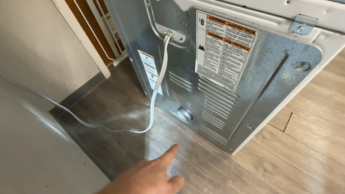 Dryer rear panel opened for diagnosis during a Ventura repair visit
